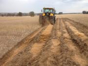 One-way disc plough in action