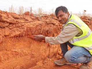 DPIRD research scientist and project leader Dr Gaus Azam looks over a trial site at Bonnie Rock, where the site has recently been excavated to a depth of 80cm.