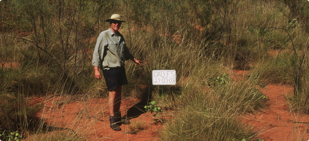 Photograph of a DAFWA rangeland officer on a state monitoring site