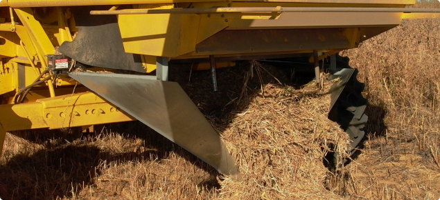 Modifications to the header to generate a narrow chaff trail concentrating weed seeds and allowing a hot burn