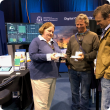 eConnected's Alison Lacey (Manager, Narrogin) speaks with farmers Rob Rex (Wagin) and Warren Pensini (Boyup Brook) about eConnected's LoRaWAN on-farm connectivity network with a demo board and devices.