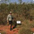 Photograph of a DAFWA rangeland officer on a state monitoring site