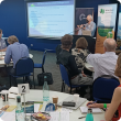 Professor Richard Eckard presenting to a group of attendees