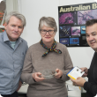 Department of Agriculture and Food (DAFWA) entomologist Rob Emery, CSIRO researcher Jane Wright and DAFWA technical officer David Cousins with a spring-active beetle Onthophagus vacca, which will be released this week at sites around Kojonup. 